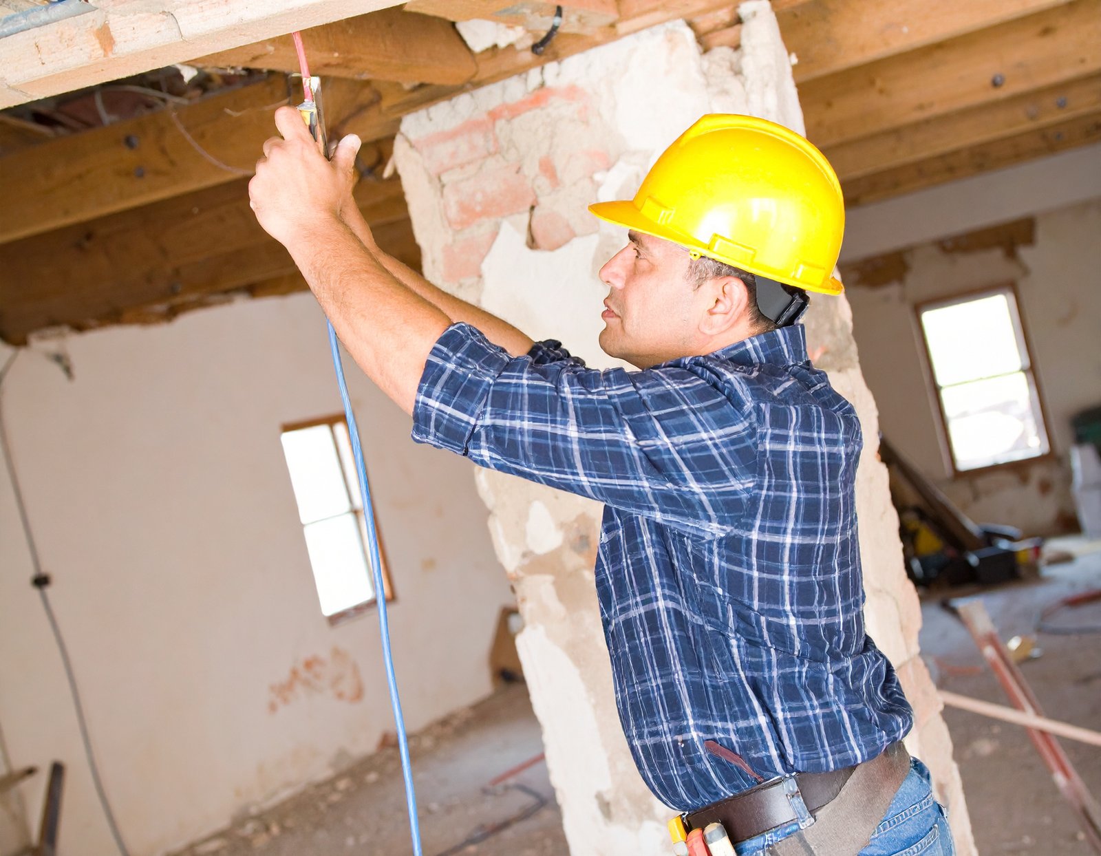 Licensed electrician rewiring electrical panel in Austin TX home